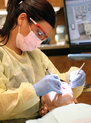 Dental hygienist and patient at AFRH Dental hygienist and patient at AFRH